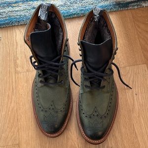 John Fluevog fleece-lined dark green wing-tipped lace-up boots.